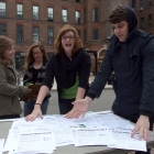 Anna and Rhett with the surveys collected during Green Week